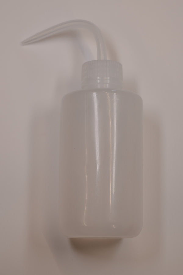 Water cleansing bottle
